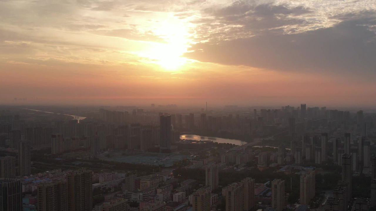 城市清晨日出彩霞航拍山东聊城  