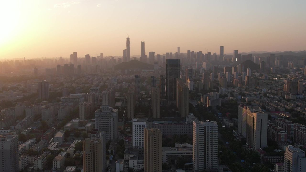 城市清晨迷雾高楼航拍 