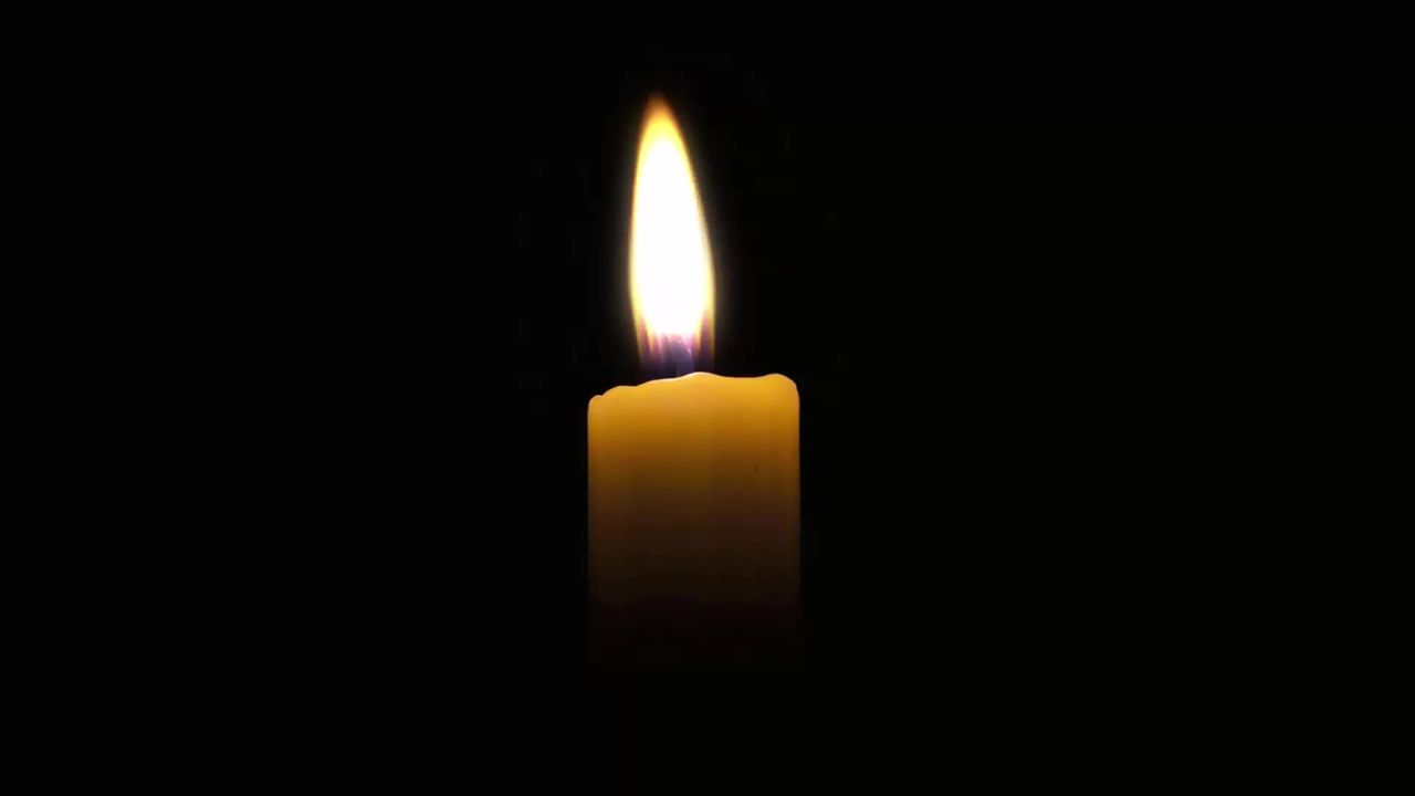 蜡烛火焰光丧烧伤火烛火闪烁沉思黑黑色休息冥想背景