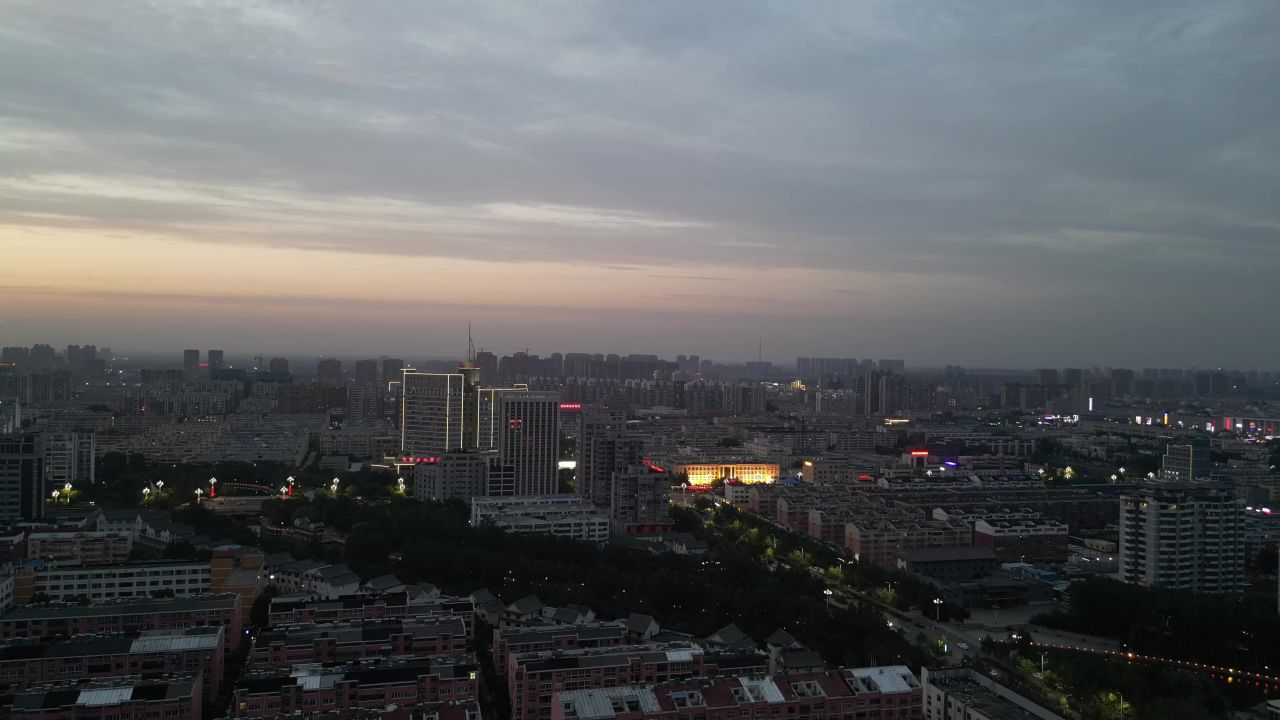 航拍山东聊城城市傍晚灯光