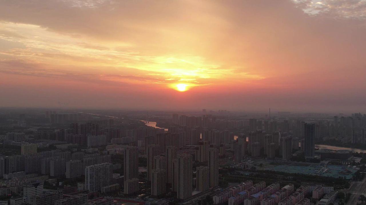 城市清晨日出彩霞航拍山东聊城  