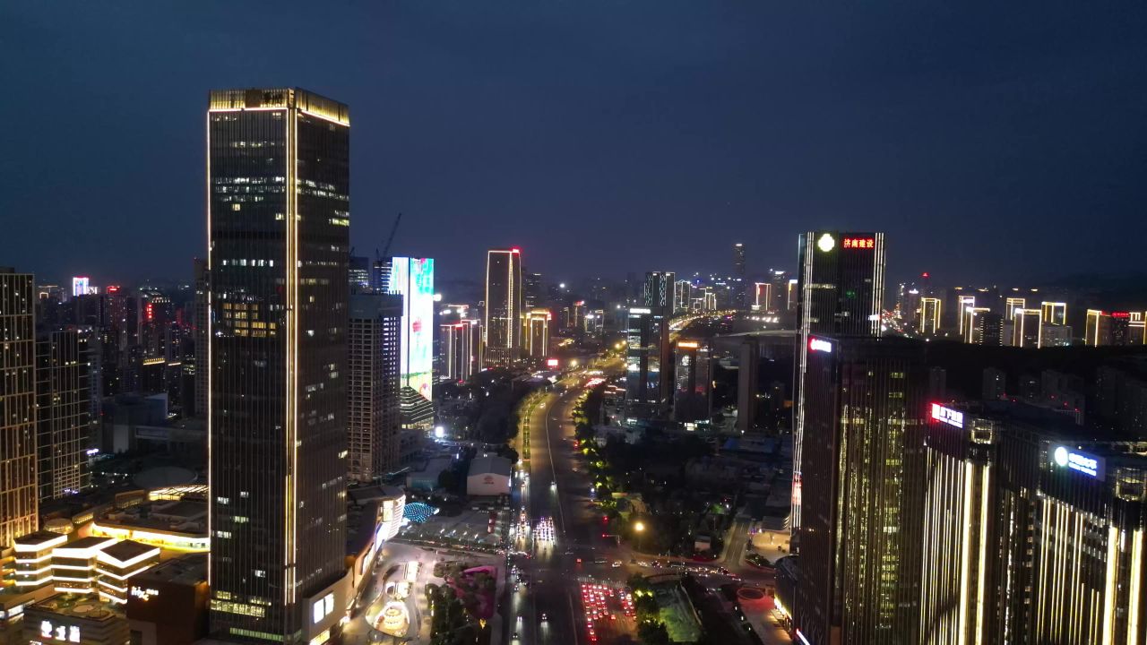 航拍山东济南奥体中心经十路夜景
