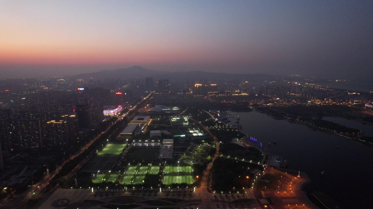 山东日照夕阳晚霞夜幕降临夜景灯光航拍 