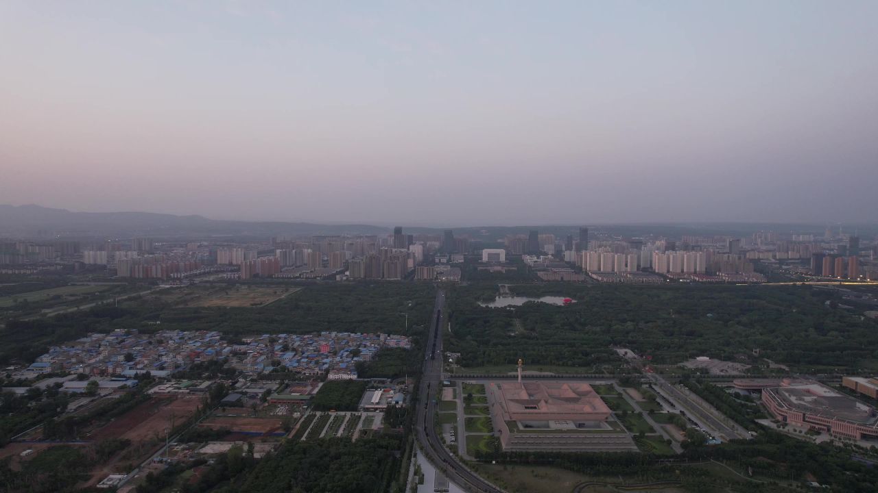 河南洛阳城市清晨日出彩霞航拍