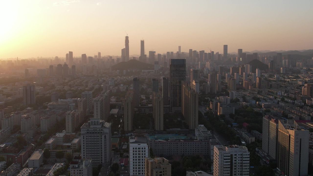 城市清晨迷雾高楼航拍 