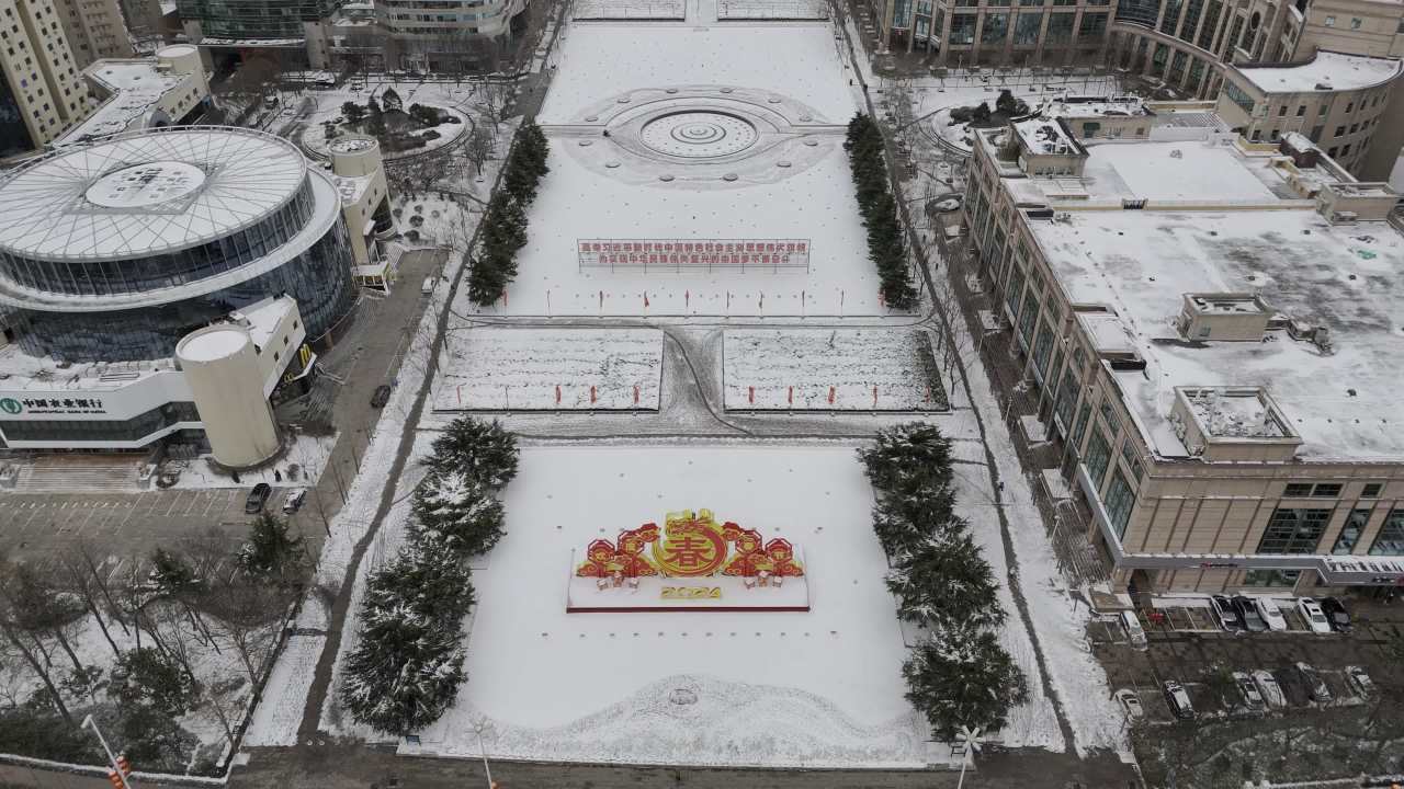 青岛五四广场情人坝海边城市雪景航拍 6