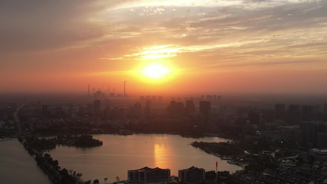城市夕阳晚霞火烧云夜景降临山东聊城