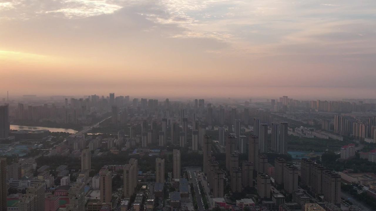 城市清晨日出彩霞航拍山东聊城  