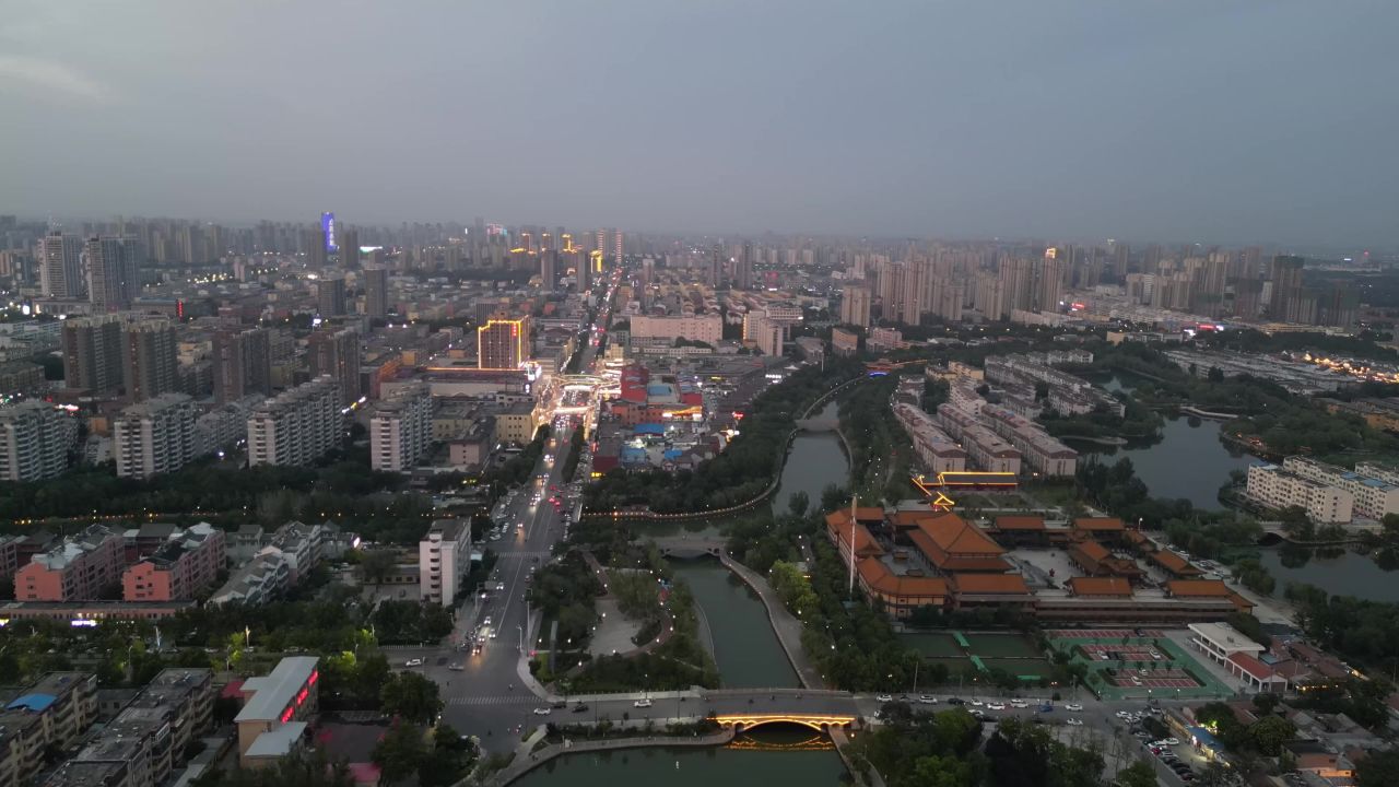 航拍山东聊城城市傍晚灯光