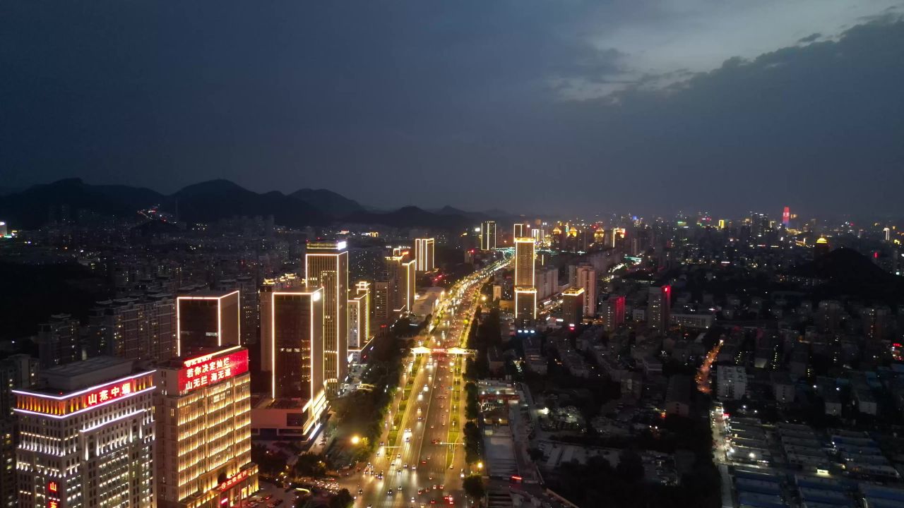 航拍山东济南奥体中心经十路夜景