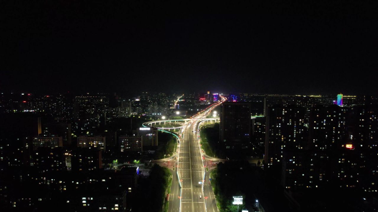山东潍坊城市大道夜景交通车辆行驶航拍