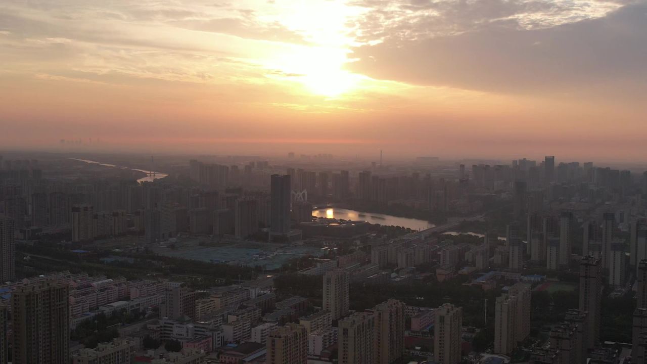 城市清晨日出彩霞航拍山东聊城  