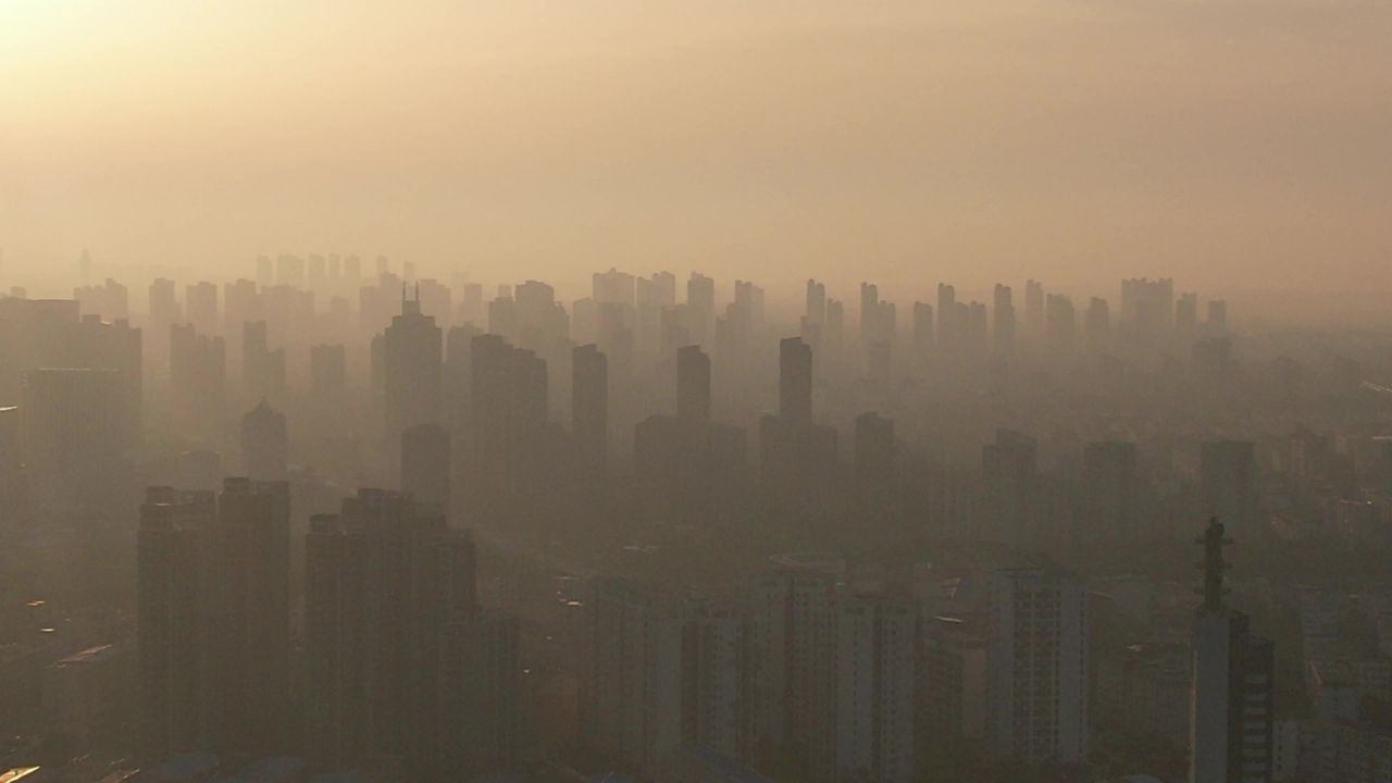 河南许昌城市日落迷雾航拍