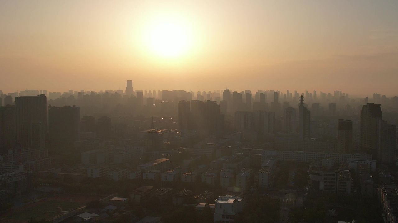 河南许昌城市日落迷雾航拍