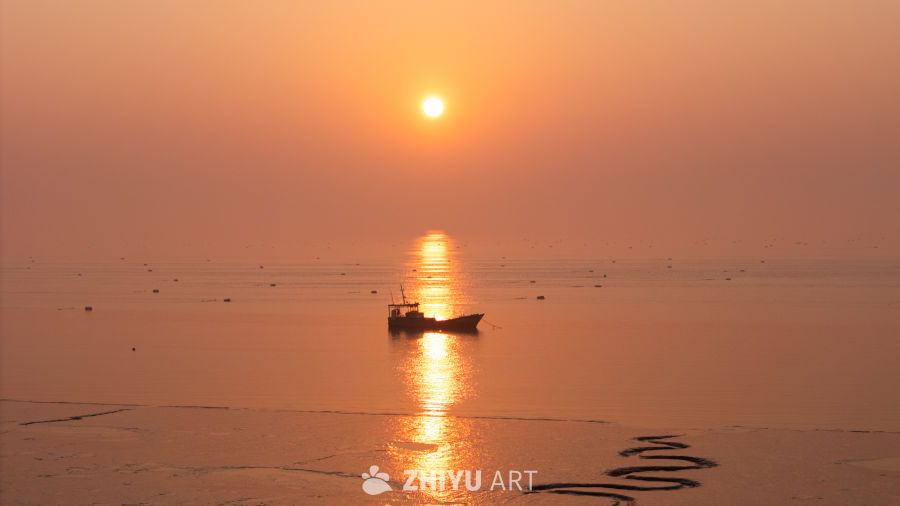海盐观海园岸边的日出