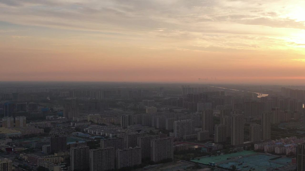 城市清晨日出彩霞航拍山东聊城  