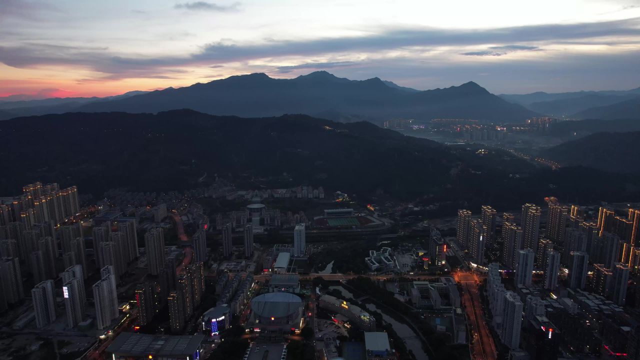福建龙岩城市落日晚霞夕阳夜幕降临航拍 