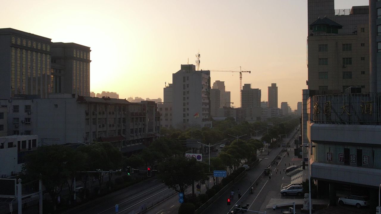 河南许昌城市日落迷雾航拍