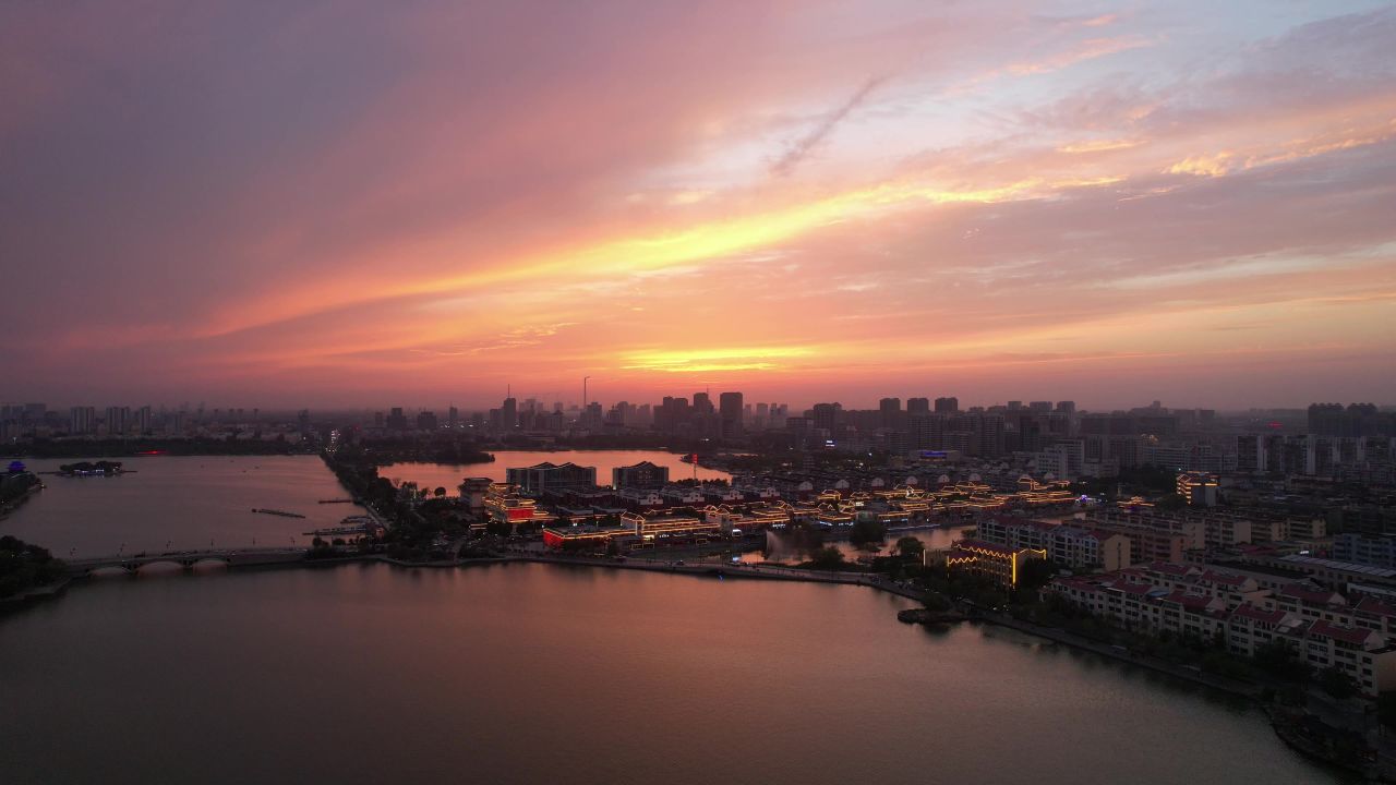 城市夕阳晚霞火烧云夜景降临山东聊城 