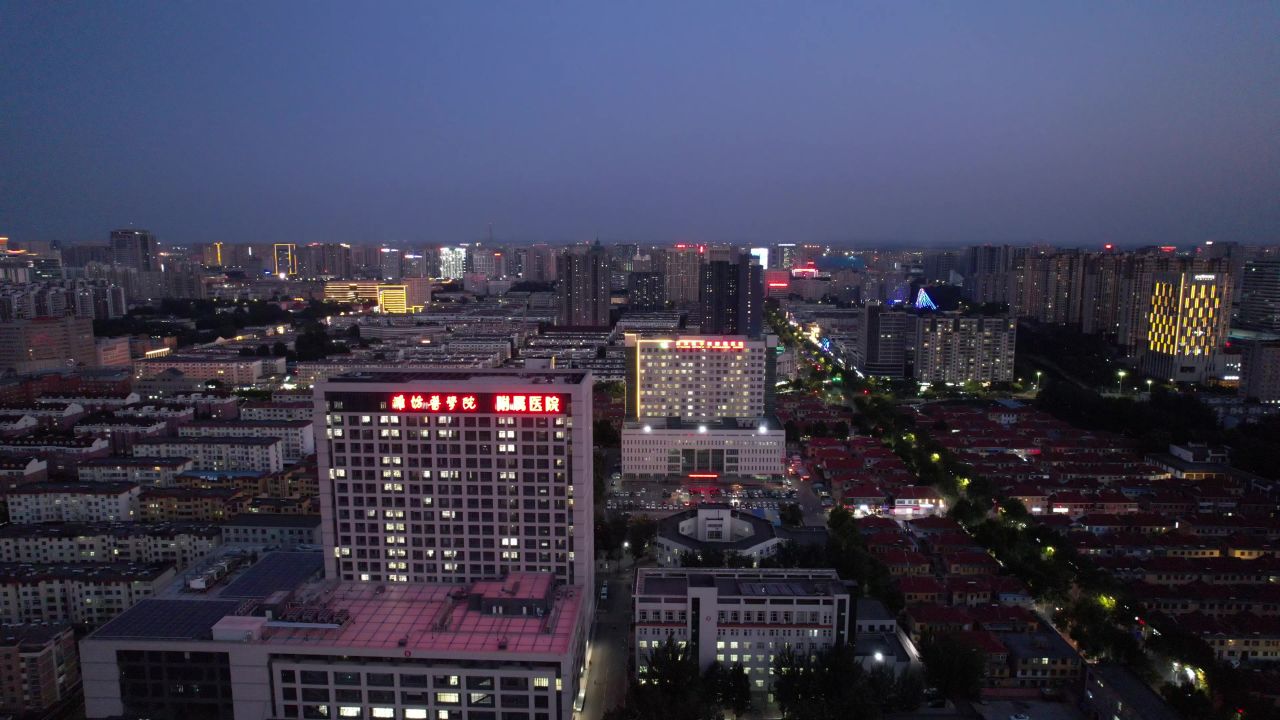 山东潍坊城市晚霞夜幕降临夜景灯光交通航拍 