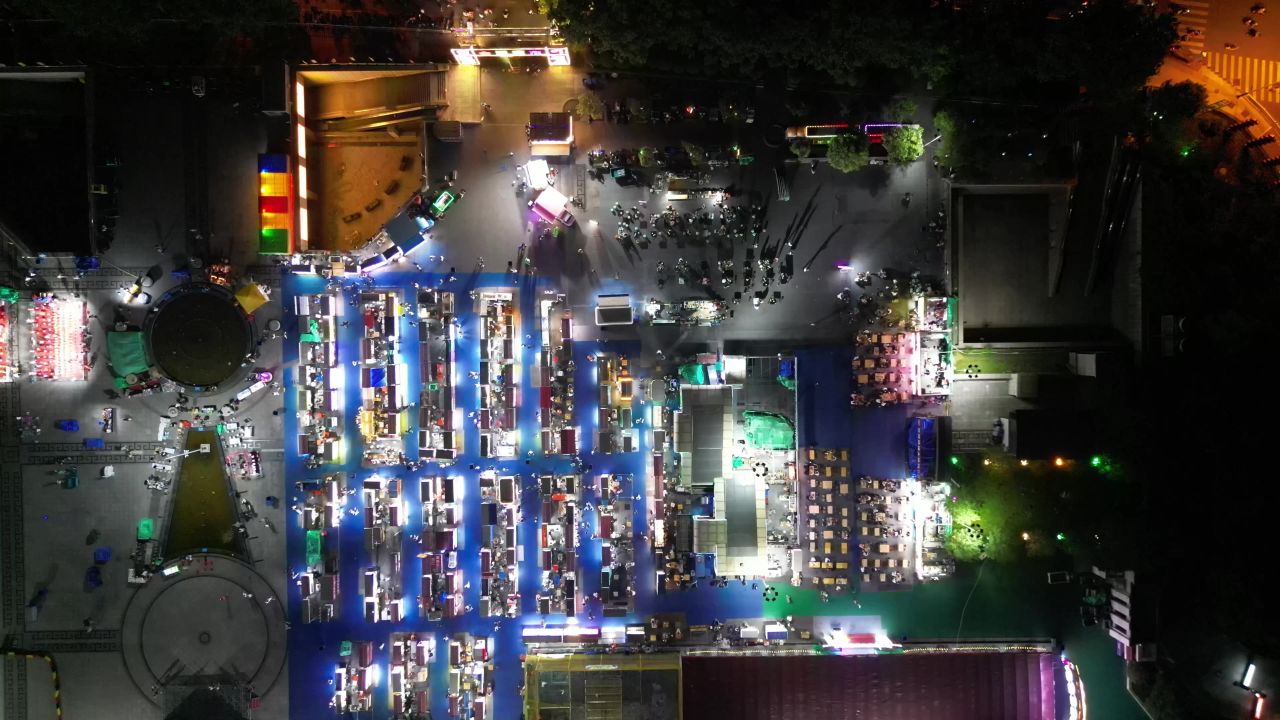  航拍山东泰安会展中心夜市夜景