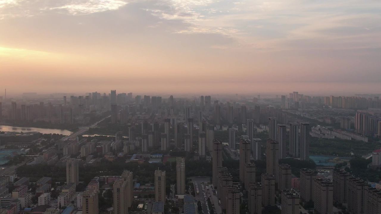城市清晨日出彩霞航拍山东聊城  