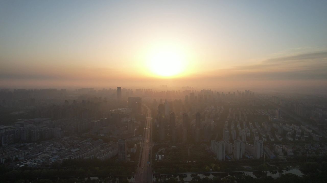 河南许昌城市日落迷雾航拍