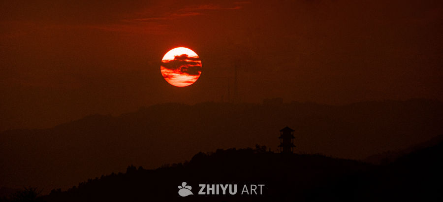 红日映山塔