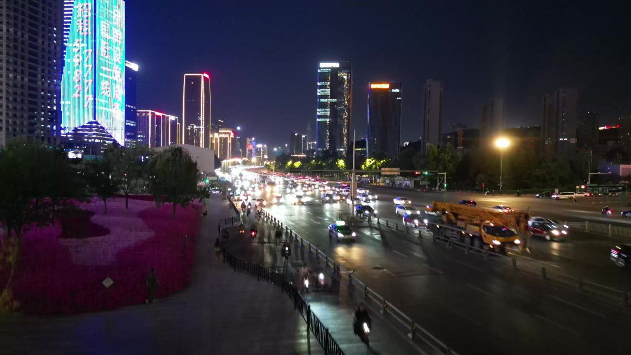 航拍山东济南奥体中心经十路夜景