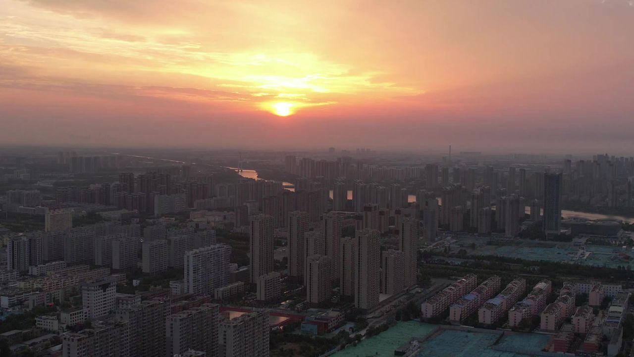 城市清晨日出彩霞航拍山东聊城  