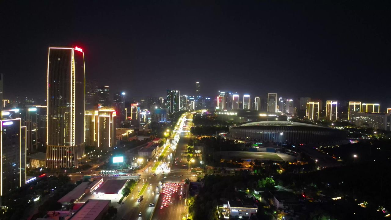 航拍山东济南奥体中心经十路夜景
