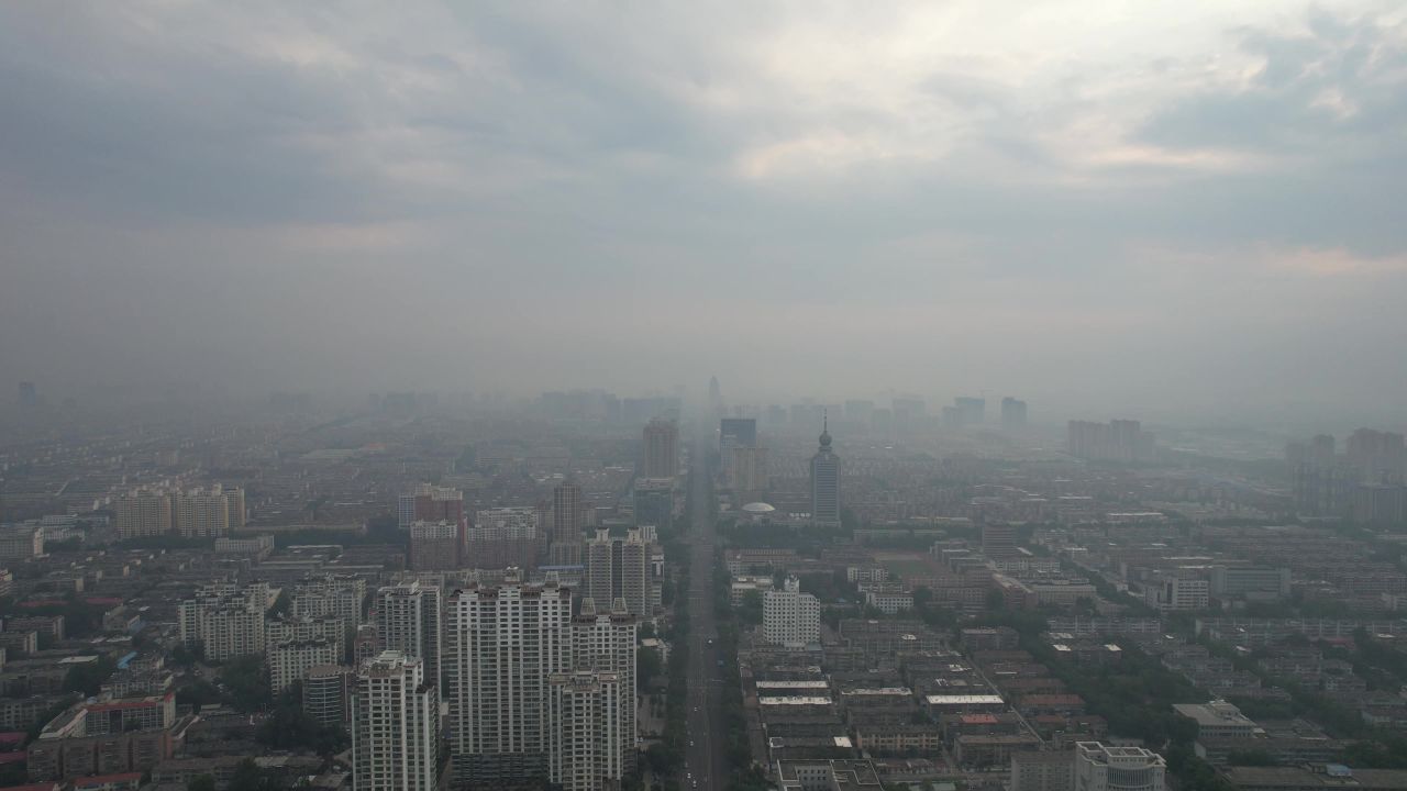 山东淄博清晨城市迷雾日出彩霞航拍 