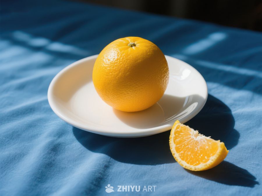 橙子与切片置于蓝色布上的白色盘中 79