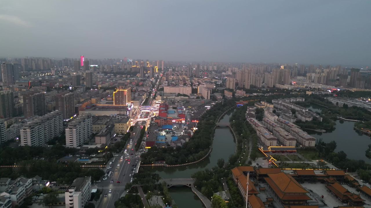 航拍山东聊城城市傍晚灯光