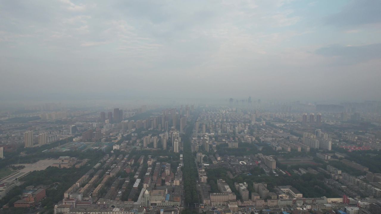山东淄博城市清晨日出迷雾航拍
