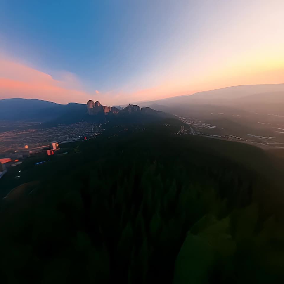 从高空视角拍摄的景色，可以看到连绵起伏的山脉，其中