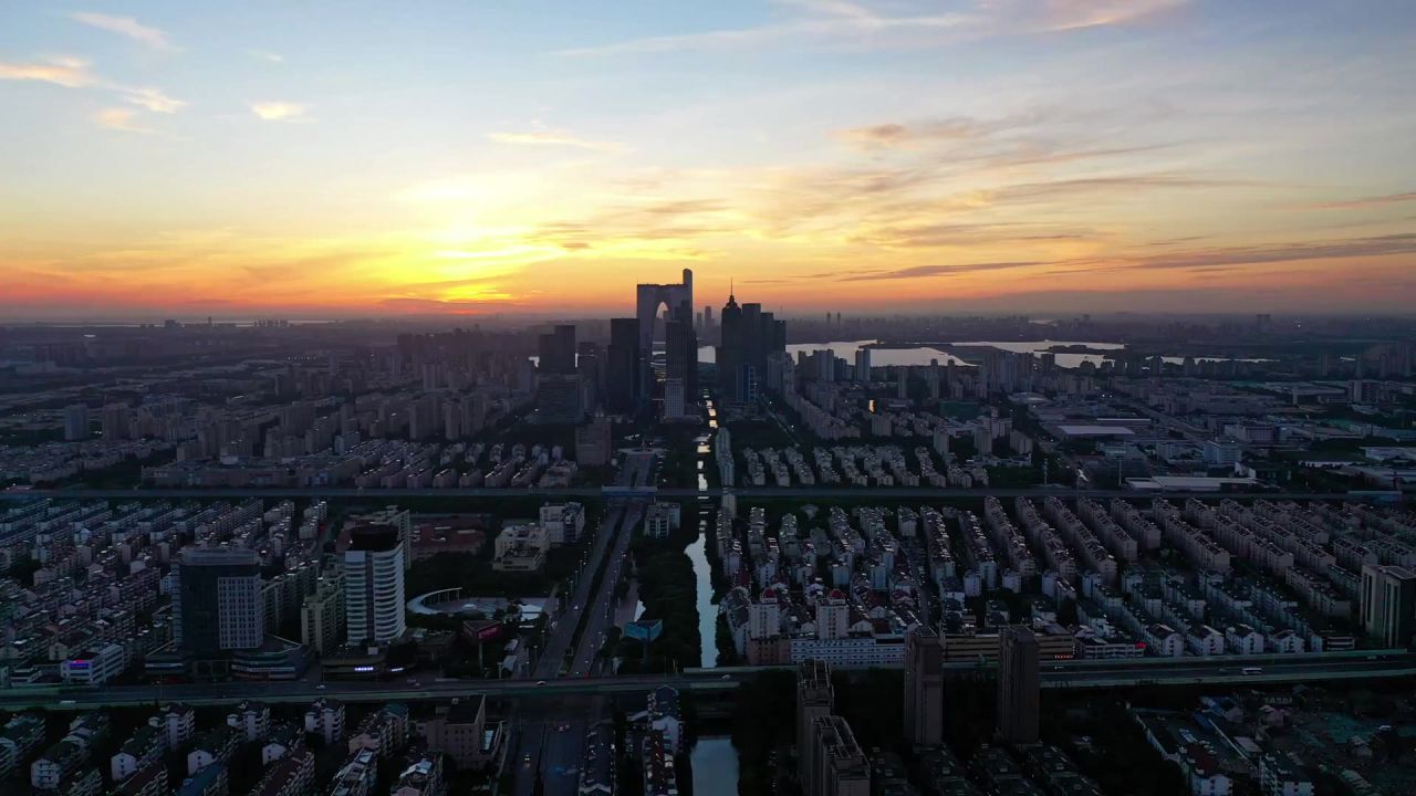 高清航拍苏州城市建筑物黎明时分日出