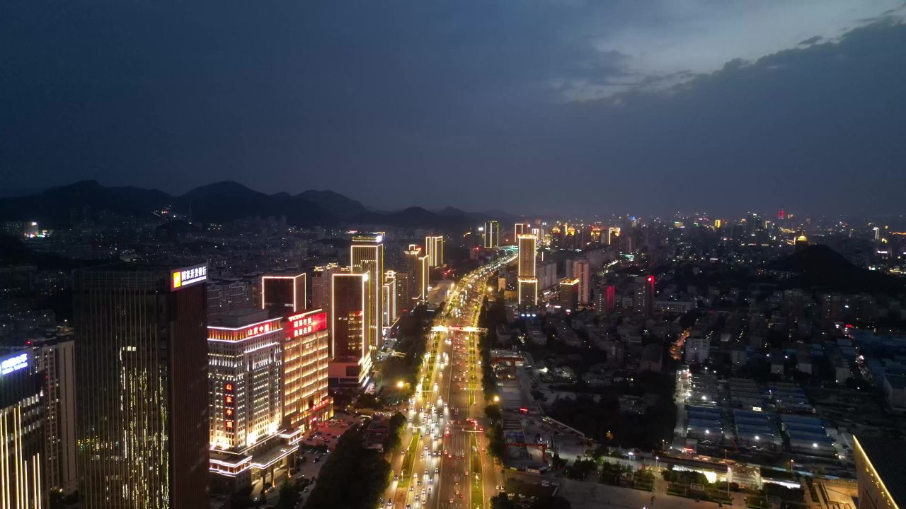 航拍山东济南奥体中心经十路夜景