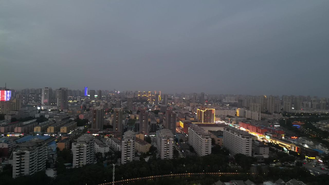 航拍山东聊城城市傍晚灯光