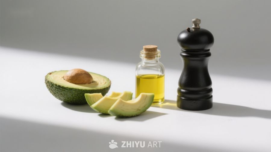 牛油果、橄榄油与胡椒磨的静物组合