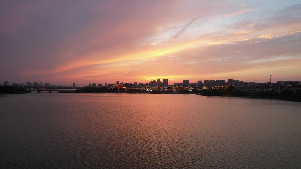 城市夕阳晚霞火烧云夜景降临山东聊城 