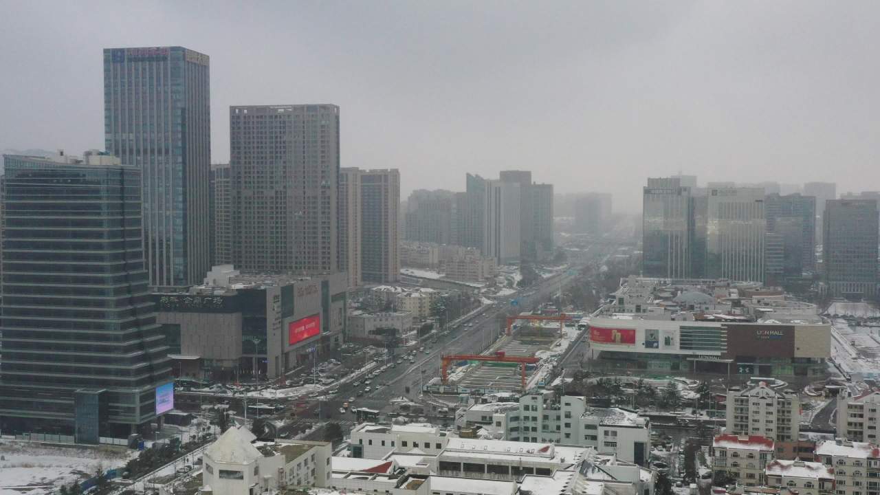 青岛石老人浴场海边雪景航拍 10