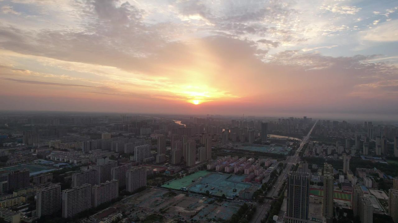 城市清晨日出彩霞航拍山东聊城  