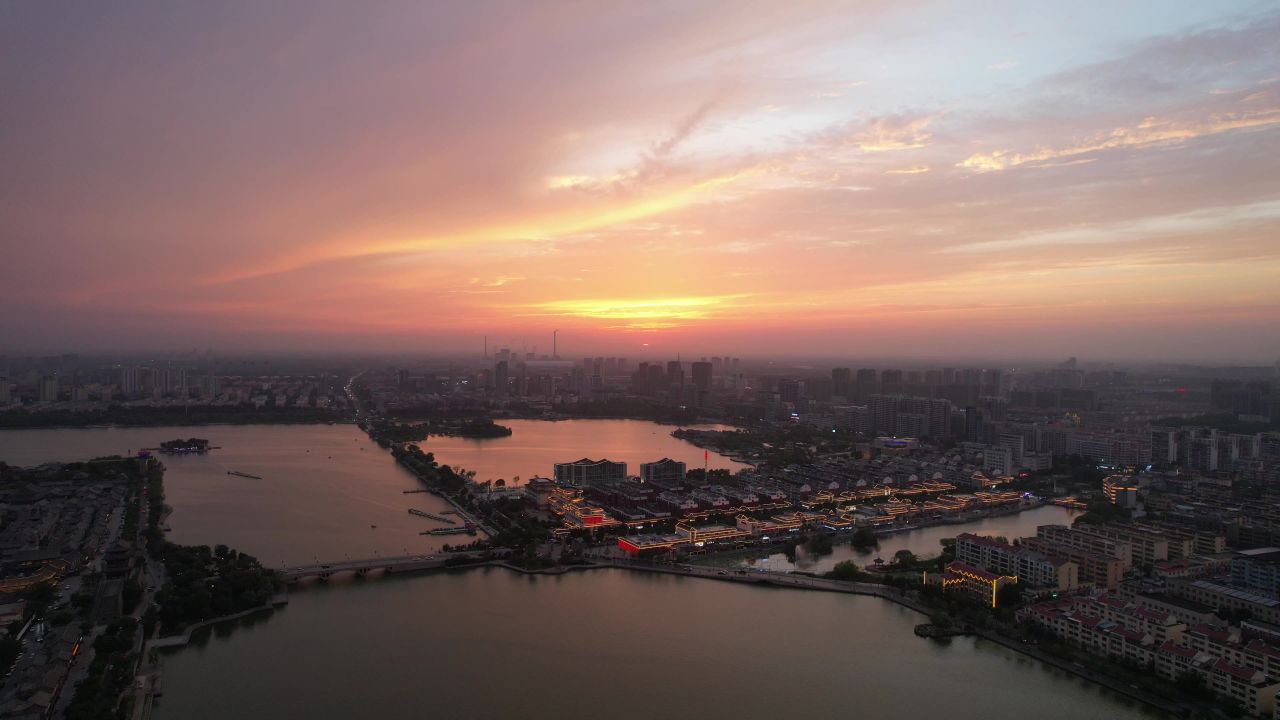 城市夕阳晚霞火烧云夜景降临山东聊城 