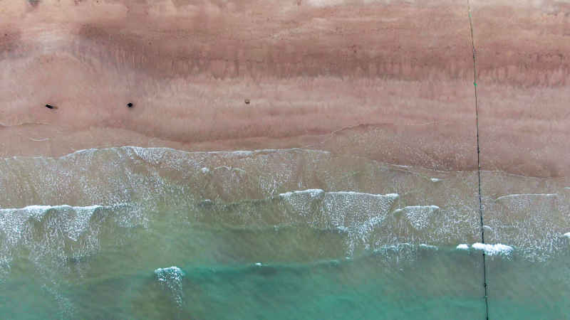大海海洋沙滩礁石风景航拍摄影图 