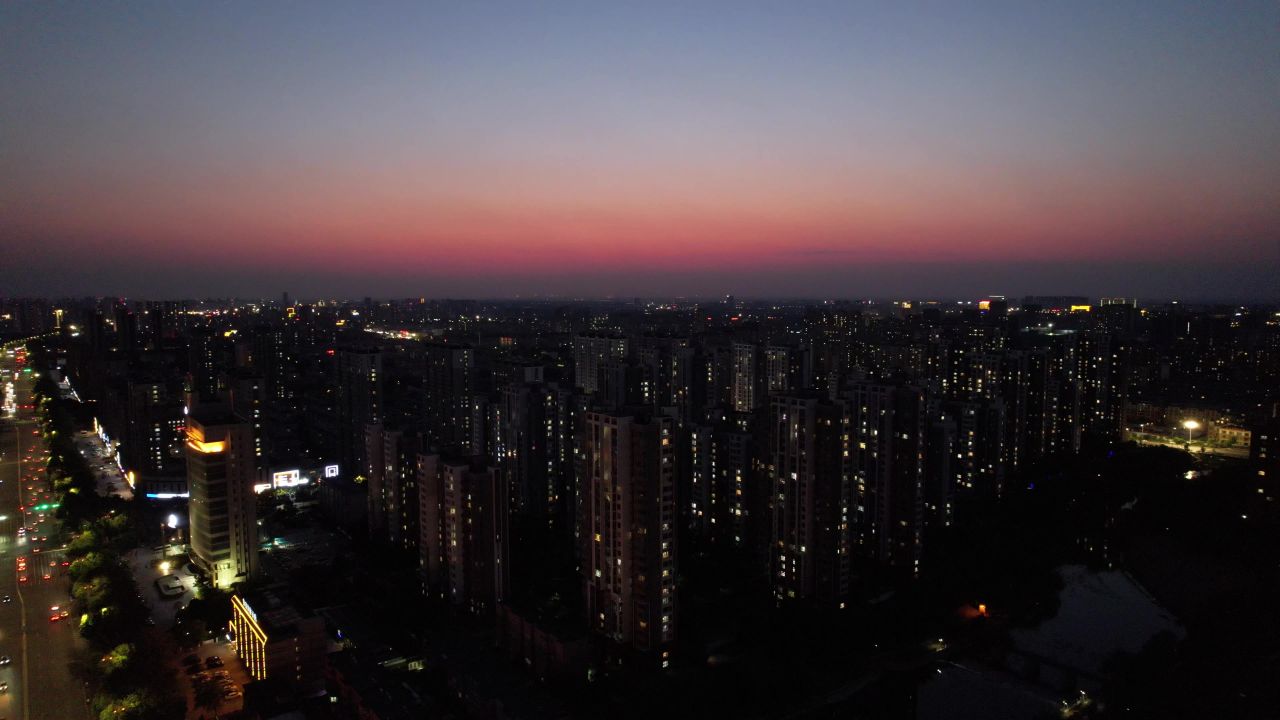 山东潍坊城市晚霞夜幕降临夜景灯光交通航拍 