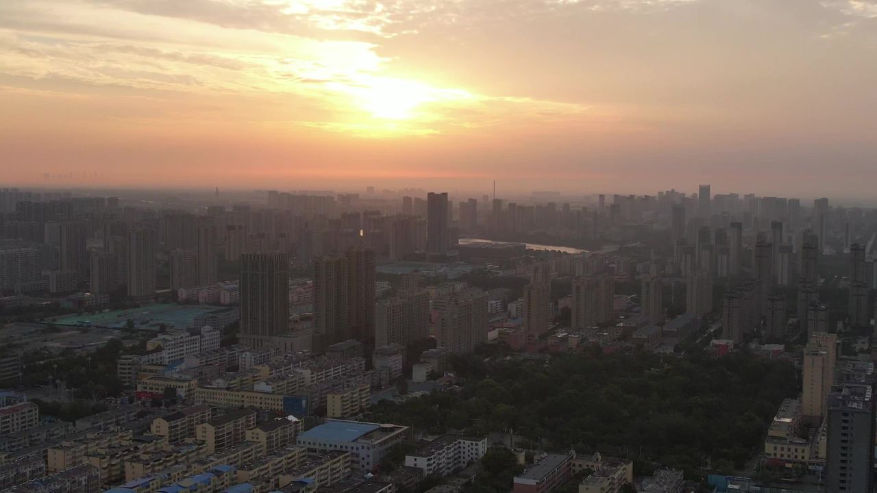 城市清晨日出彩霞航拍山东聊城  