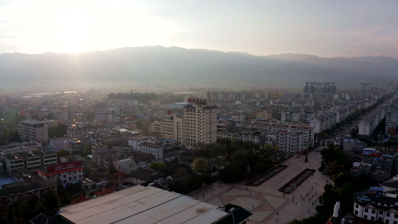 云南楚雄姚安县城市日出风光航拍延时