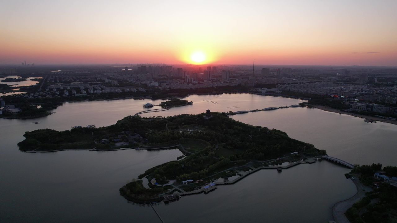 城市夕阳晚霞日落航拍东营日落  