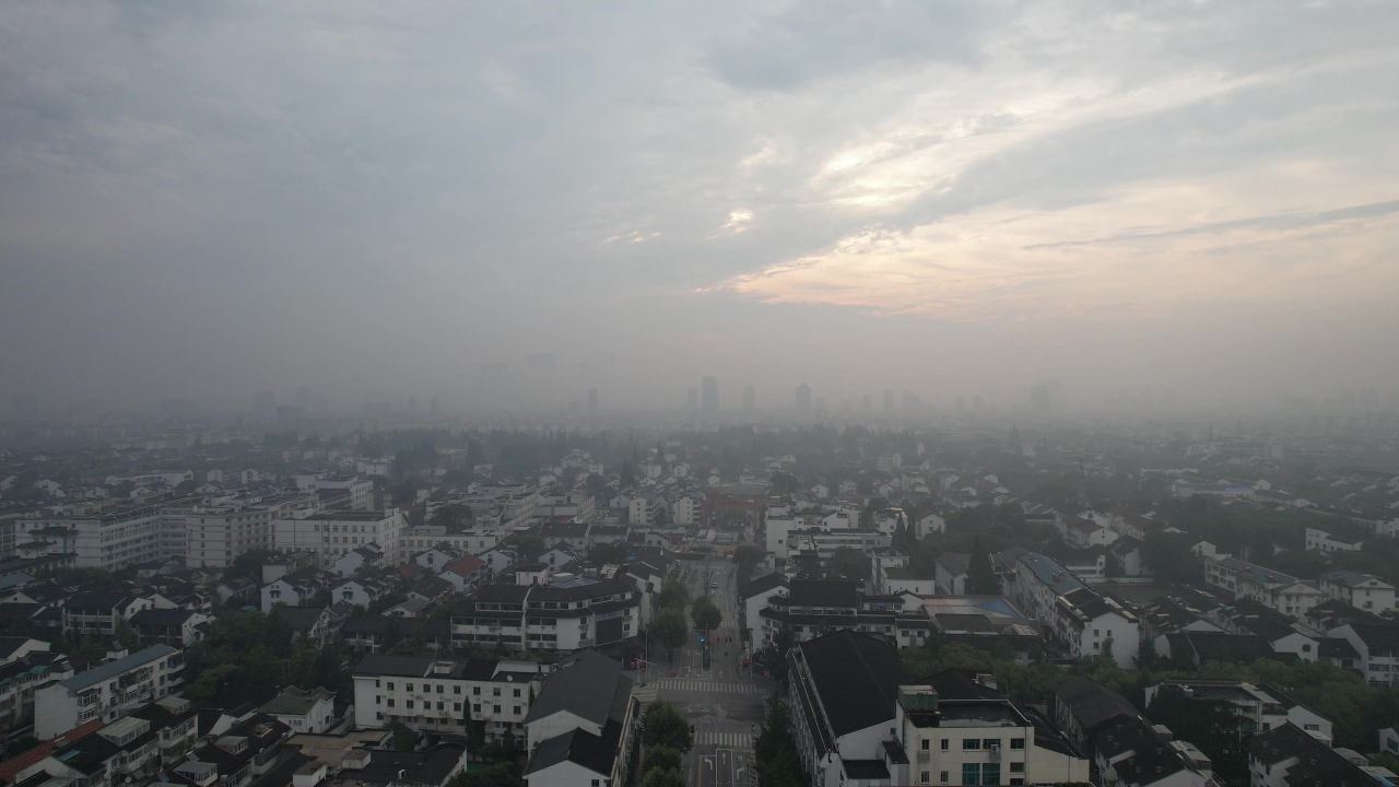 江苏苏州城市清晨迷雾日出彩霞航拍 